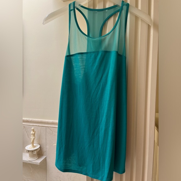 Turquoise tank size S, with sheer netting. - Picture 3 of 7